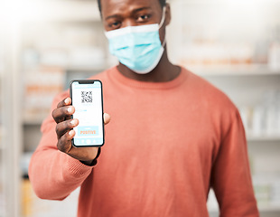 Image showing Man, covid results and phone screen in pharmacy, portrait and sad with positive test, face mask and app. African patient, upset and smartphone for compliance, registration and stop virus with barcode