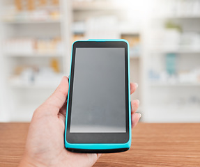 Image showing Pharmacist hand, payment machine screen and closeup for credit card, mockup space or pov in store for healthcare. Person, pos tech and promotion in medical sales, shopping or digital commerce at desk