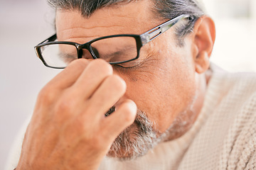 Image showing Frustrated senior man, headache and debt in stress, burnout or financial crisis at home. Mature male person with migraine, eye strain or anxiety in depression, mental health or pain or overworked