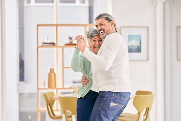 Image showing Dancing, mature couple and happy at home for anniversary, birthday or valentines celebration. Laugh, love and care of man and woman for healthy marriage, happiness and moving to music or funny laugh