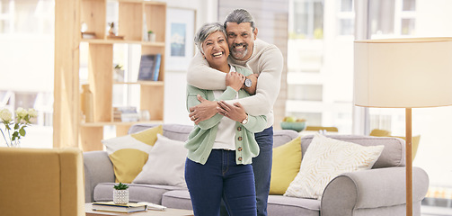 Image showing Portrait, hug and senior couple with love, home and happiness with care, bonding and retirement. Lounge, old man and mature woman embrace, affection and loving together with marriage and relationship