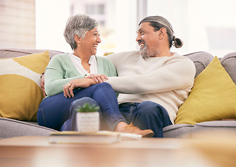 Image showing Happy, mature couple and relax on sofa in home for love, care and bonding together with marriage partner. Man, woman and hug on couch with smile, support and loyalty for relationship in living room