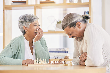 Image showing Chess, laugh and senior couple play games for relaxing, bonding and spending time together at home. Marriage, retirement and happy man and woman enjoy board game for challenge, strategy and thinking