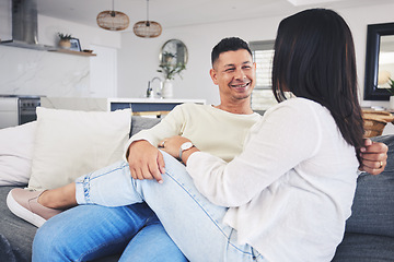 Image showing Conversation, relax and couple on a sofa in the living room talking and bonding together at home. Happy, love and husband speaking and resting with his wife in the lounge of their modern house.