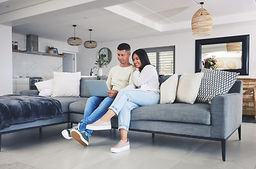 Image showing Couple, laptop and streaming a movie on the sofa in home, living room or together watching tv, film or video on social media. Happy, people and relax on computer with online movies or comedy show