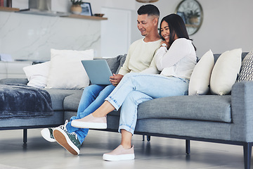 Image showing Streaming, movie and couple with laptop on the sofa in home, living room or together watching tv, film or video on social media. Happy, people and relax on computer with online movies or comedy show