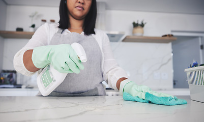 Image showing Woman, hands and cleaning kitchen table with spray bottle, detergent or bacteria or germ removal at home. Female person, maid or cleaner wiping surface with cloth in clean hygiene or sanitize house