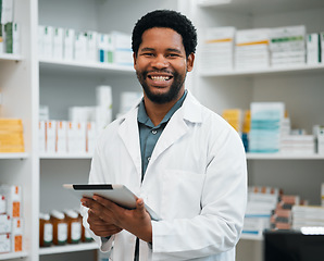 Image showing Pharmacy portrait, pharmacist man and tablet in medicine management, stock research or inventory shelf. Digital technology, retail software and healthcare doctor or african person in medical services