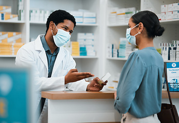 Image showing Pharmacist, face mask or black man giving pills to woman patient in customer service for wellness advice. Healthcare help, African pharmacy or doctor with pharmaceutical medicine or medical product