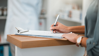 Image showing Hands of woman at pharmacy, clipboard and medical insurance information at counter for script medicine. Prescription, writing and patient at pharmacist with application form for pharmaceutical drugs.