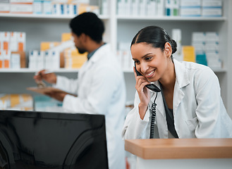 Image showing Pharmacist, woman and telephone for medicine stock, customer support and inventory communication or retail service. Medical worker or doctor on phone call and computer for pharmacy or healthcare FAQ