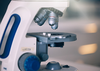 Image showing Microscope, lab and science research with technology testing for a pharmaceutical or medical study. Chemistry, biometric and molecule analytics equipment for particles and dna process in a hospital