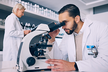 Image showing Scientist man, microscope analysis and lab for medical research, molecules or particles of bacteria at pharma job. Science team, people and vision for studying virus with pharmaceutical innovation