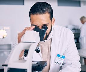 Image showing Science man, microscope and test in lab, medical analysis and pharma job for molecules, particles or bacteria. Scientist, research and thinking for vision, studying virus or pharmaceutical innovation