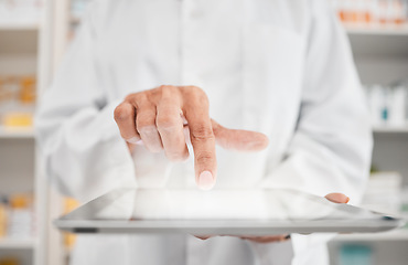 Image showing Person, pharmacist and hands with tablet for inventory inspection, checking stock or research at pharmacy. Closeup of medical or healthcare worker with technology app in pharmaceutical or drugstore