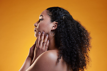 Image showing Beauty, curly and hair with profile of woman in studio for texture, makeup and cosmetics. Self care, salon and hairstyle with model on orange background for skincare, spa treatment and glow mockup