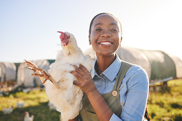 Image showing African farmer woman, chicken and portrait outdoor in field, healthy animal or sustainable care for livestock at agro job. Poultry entrepreneur, smile and bird in nature, countryside or agriculture