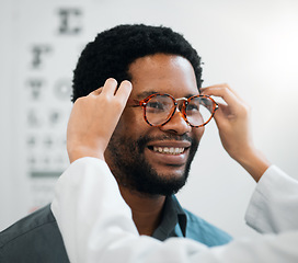 Image showing Black man, glasses and hands, vision and eye care, test and optometry with health and smile. Prescription lens, frame choice and healthcare, eyewear and optometrist with wellness and medical service