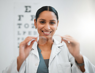 Image showing Doctor, woman and glasses, vision and eye care, portrait and optometry with health and smile. Prescription lens, frame choice and healthcare, eyewear and optometrist with wellness and medical service