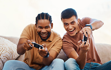 Image showing Men on couch with video games, excited fun and relax in home living room together on internet with controller. Online gaming, esports and happy gamer friends on sofa playing virtual app in apartment.