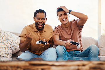 Image showing Men on sofa playing video game, excited fun and relax in home living room together on internet with controller. Online gaming, esports and happy gamer friends on couch with virtual app in apartment.