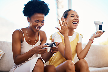 Image showing Women on sofa playing video game, laughing and relax in home living room together on internet with controller. Online gaming, esports and happy gamer girl friends on couch on virtual app in apartment