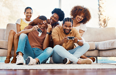 Image showing Group of friends on couch, video games for fun and relax in home living room together with internet controller. Online gaming, playing esports app and sofa, happy gamer men and women in apartment.