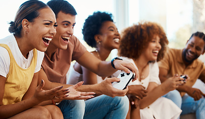 Image showing Friends together on sofa, video game fun and relax in home living room playing with internet controller. Online gaming, virtual esports app and couch happy group of gamer men and women in apartment.