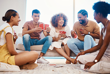 Image showing Game, laughing or friends playing cards, poker or black jack at home gambling together in a holiday party. Happy people, men or group of funny women relax in living room in a fun match competition