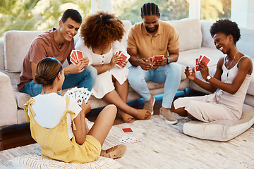 Image showing Game, happy or friends playing cards, poker or black jack at home for gambling together in a holiday party. Smile, men or group of women laughing to relax in living room in a fun match competition