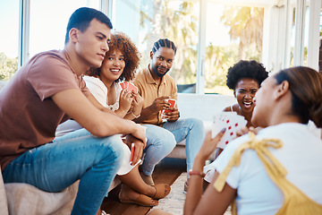 Image showing Gambling, happy people or friends playing cards, poker or black jack at home to relax together in a party. Smile, men or group of women laughing in living room in a fun match or game on holiday