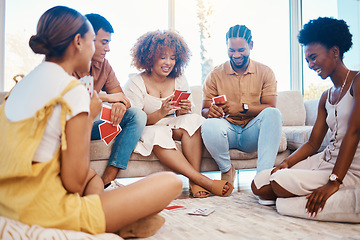 Image showing Relax, happy people or friends playing cards, poker or black jack at home for gambling together in a party. Smile, men or group of women laughing in living room in a fun match or game on holiday