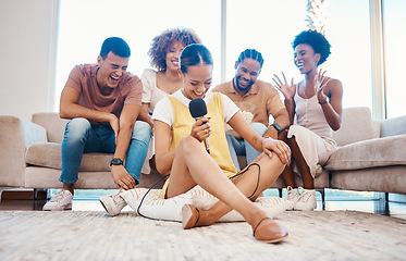 Image showing Microphone, laughing or friends singing in home living room together in a party on holiday vacation break. Girl singer, happy men or group of funny women relax in a fun karaoke competition or game