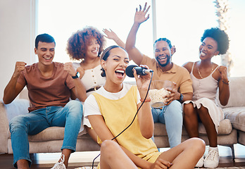 Image showing Microphone, happy people or friends singing in home living room together in a party on holiday vacation break. Girl singer, men or group of funny women laughing in a fun karaoke celebration or game