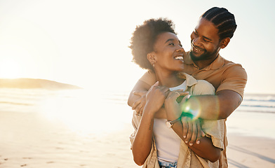 Image showing Smile, hug and couple at the beach at sunset for travel, romance and relax in nature together. Love, freedom and happy man with black woman at sea embrace, connect and enjoy ocean adventure in Miami