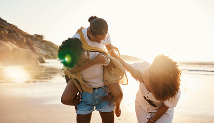 Image showing Beach, sunset and friends piggyback, fun ride and reunion on social holiday, outdoor adventure and summer wellness. Sunshine flare, freedom and young women bonding on nature walk, trip or journey