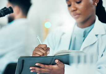 Image showing Results, black woman or scientist writing research notes for analysis on experiment or medical information. Notebook, biologist or expert in a laboratory with documents info for science development