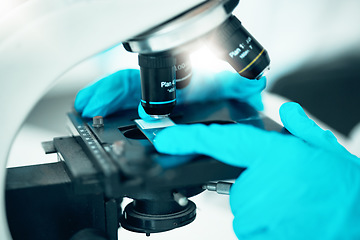 Image showing Microscope, medical science and research in a laboratory for analysis, study or development. Zoom on equipment for research, future and gloves of scientist person with virus, particle or dna sample