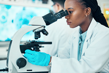 Image showing Microscope, research and female scientist in a laboratory for a medical or pharmaceutical study. Professional, scientific and African woman researcher working on chemistry breakthrough with equipment