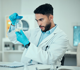 Image showing Science, results and man with bottle in laboratory, research and medical engineering with soil sample. Biotechnology, botany study and nature, scientist or lab technician checking sand in glass jar.