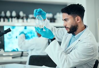 Image showing Science, chemical and research with man in laboratory for liquid analysis. medical and pharmacy. Medicine, healthcare and results with scientist and beaker for virus vaccine, test and assessment