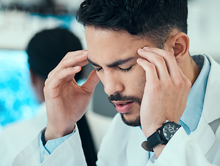 Image showing Anxiety, man or scientist with headache stress in a laboratory with burnout, migraine or bad head pain. Exhausted, face or frustrated expert with medical or science research with fatigue or tension