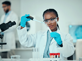 Image showing Science, blood and research, black woman with test tube in laboratory and medical engineering solution. Biotechnology, vaccine study and liquid in pipette, scientist or lab technician checking sample
