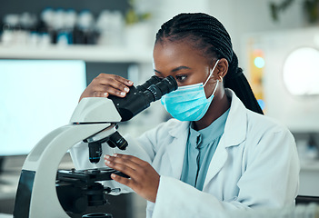 Image showing Woman, science and microscope for laboratory research, blood test and dna or virus analysis with face mask. Professional scientist or medical student in biotechnology and check for covid or bacteria