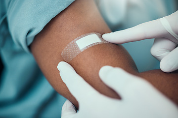 Image showing Plaster, vaccine and hands of nurse with patient with bandage for flu shot, injection and immunity. Healthcare, hospital and closeup of arm of person for medicine, vaccination and virus protection