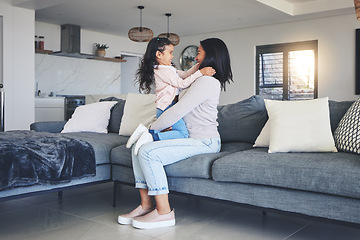 Image showing Relax, happy and playful with mother and daughter on sofa for love, care and support. Funny, calm and smile with woman and young girl embrace in living room of family home for peace, cute and bonding
