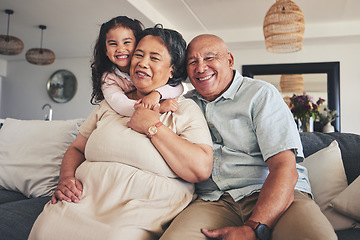 Image showing Happy, hug and portrait of grandparents and child on sofa for smile, bonding and support. Love, happiness and relax with Mexico family and embrace in living room at home for calm, cheerful and peace