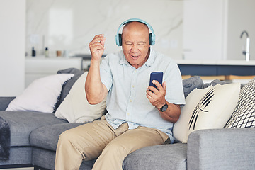 Image showing Headphones, phone and old man in living room dancing on sofa, listening to streaming radio and relax. Music, fun and excited senior person on couch with cellphone, earphones and online in retirement.