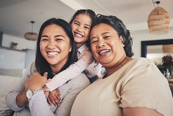 Image showing Hug, women and generations with portrait of family on sofa for smile, bonding and support. Happy, relax and grandparent with mother and child in living room at home for calm, care and peace together