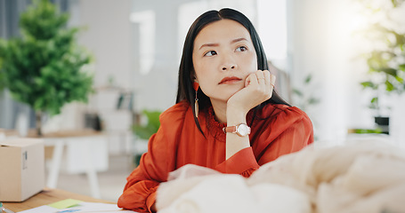 Image showing Woman or fashion designer thinking of ideas in manufacturing studio, inspiration or planning clothes production. Asian person contemplating creative or thoughtful strategy in textile, tailor business